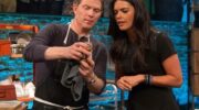 Bobby Flay shows a guest his phone screen