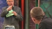 Jerry Springer speaks to a guest with relationship issues