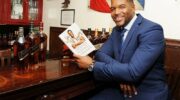 Michael Strahan with his self help book "Wake Up Happy"