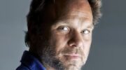 Norbert Leo Butz plays the role of Alfred P. Doolittle