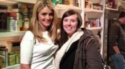 Co-host Daphne Oz takes a photo with an audience member
