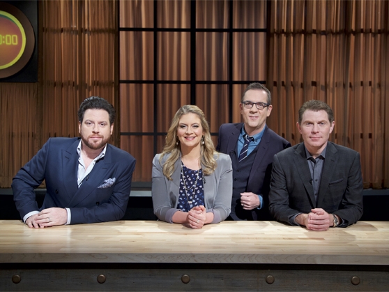 Bobby Flay alongside his panel of judges.